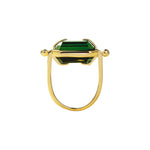 Ring with a green crystal